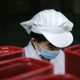 内容审核人员赵女士的职业头像照片，神情认真专注